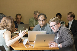 Larry Hess, an OII instructional designer, works with faculty during a session about Team-Based Learning at the 2018 conference.