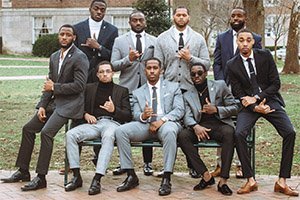 Pictured are the current brothers of Alpha Phi Alpha Phi Chapter, including President Tyrell Carter (far left). 