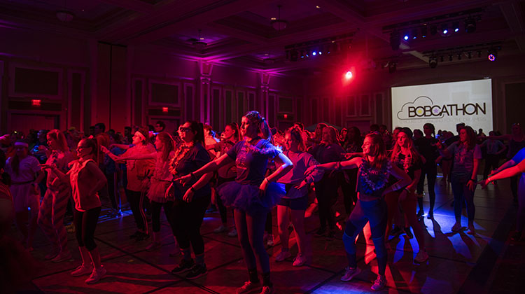 BobcaThon dancers perform the line dance they learned over the course of the 12-hour dance marathon. 