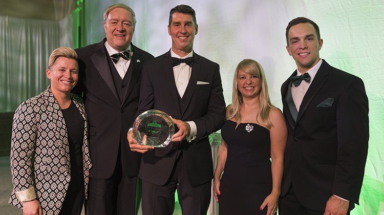 Alumnus of the Year Mark C. Arnold, BSISE ’82, (center) is pictured at the 2019 Alumni Awards Gala with (from left) Erin Essak Kopp, assistant vice president of alumni relations and executive director of the Alumni Association; Ohio University President M. Duane Nellis; Casey Christopher, BSC ’02, chair of the Alumni Association Board of Directors; and Kyle Triplett, BA ’12, chair of the Alumni Association Board of Directors’ Awards Committee.