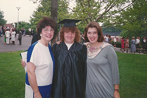 Ann Gynn, BSJ ’93, is pictured outside of the Convocation Center at Commencement in June 1993.