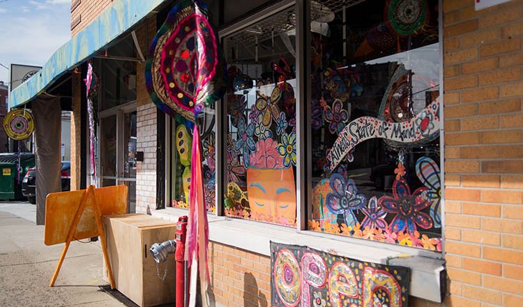 Passion Works Studio’s colorful Paint the Town Green display features this year’s Homecoming theme, “Athens State of Mind,” as well as Passion Flowers, the official flower of Athens, Ohio. 