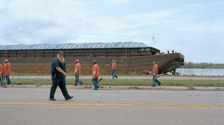 Pictured is an image from Jo Ann Walter’s “DOG Town” photo series, which documents life in the small, working-class town in the Mississippi River valley where she was born and raised. Walters, MFA ’83, returned to Ohio University as the visiting artist for the Clarence White Jr. Fund for Photography Lecture Series.