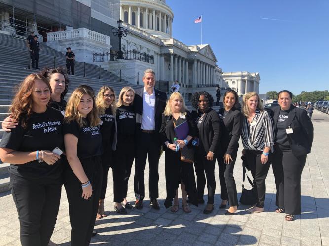 The Rachel's Angels group poses for a photo with Rep. Tim Ryan (D-OH). Ohio University student Katie Bender is third from the right.