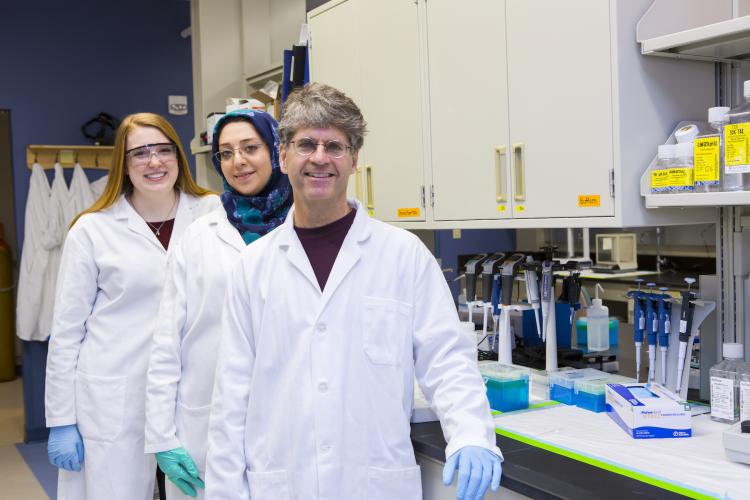 Douglas Goetz and students in lab