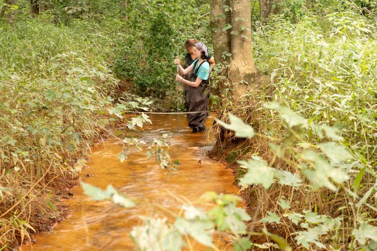 Liz Myers and Michelle Shively taking water samples