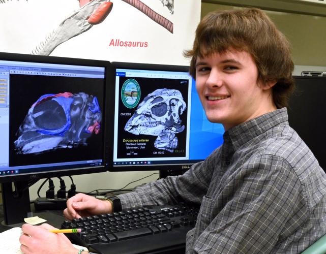 OHIO student Daniel Dunfee studying skull growth in the Jurassic ornithopod dinosaur using microCT scanning.