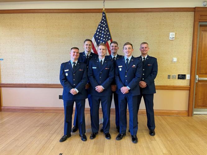 Group of six standing: Front L-R: 2Lt Carter Fee, 2Lt Kyle Dunlap, 2Lt Luke Hamlin. Back L-R: 2Lt Mark Vorndran, 2Lt Derek Weber, 2Lt Cole Losoncy