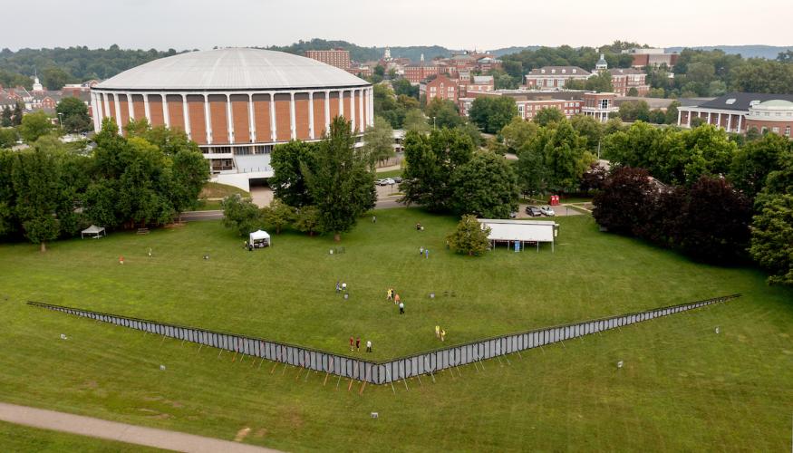 The Wall is a traveling three-quarter-sized replica of the Vietnam Veterans Memorial in Washington, D.C., set up in Tailgreat Park with the Convo Center overlooking.