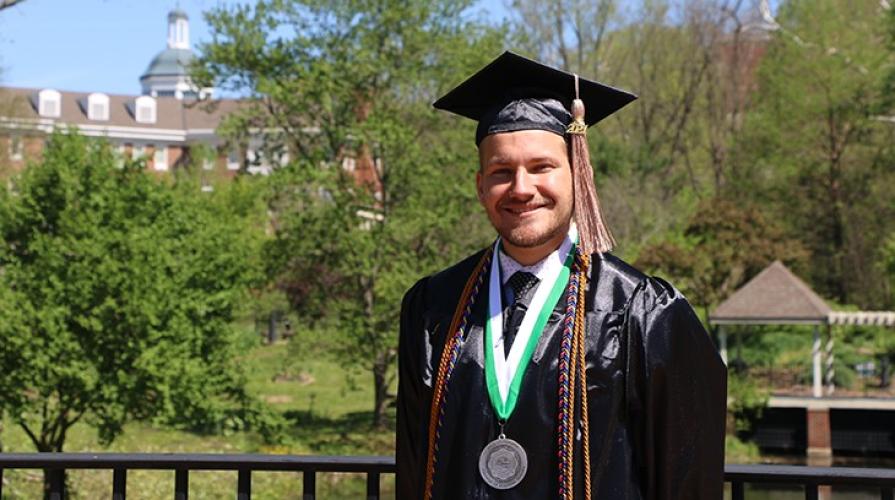 Jameson Hern in graduation robes