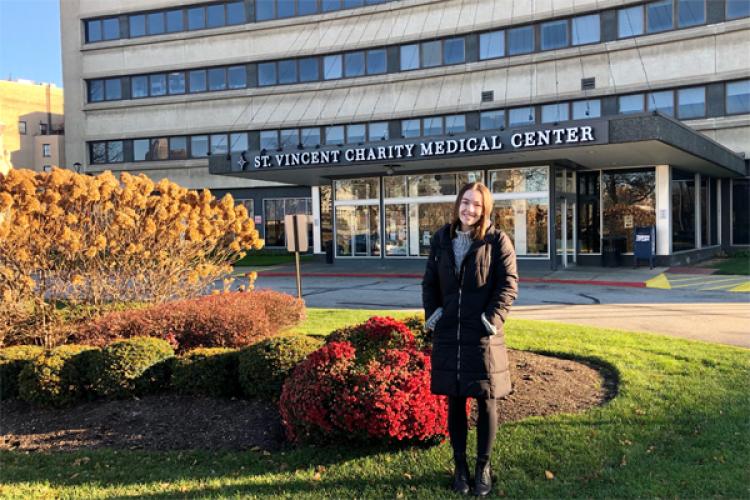 Liz Lattner stands outside the St. Vincent Charity Medical Center