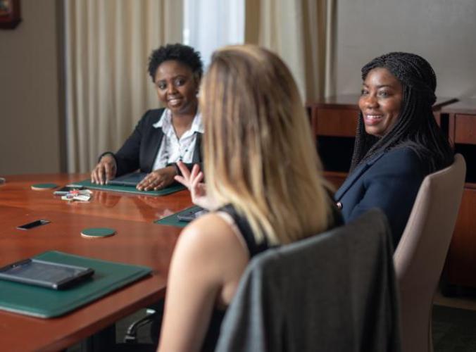 Dr. Caroline Kingori in a meeting in Kenya