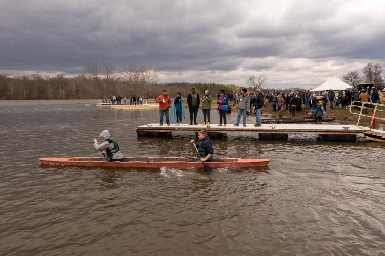 The Ohio University concrete canoe team tests its canoe in Lake Snowden.