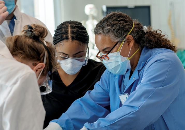 Medical students study in the new anatomy lab inside Heritage Hall under the direction of Professor of Anatomy Dr. Susan Williams. 