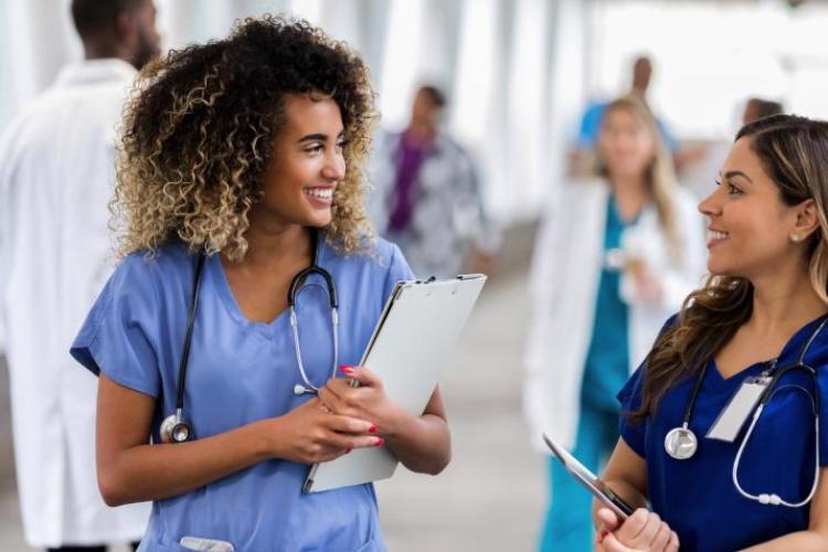 Health Workers smiling at eachother