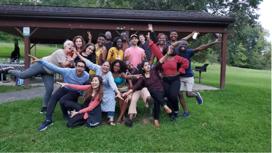 CommDev students enjoying the traditional international potluck held every year during the fall semester