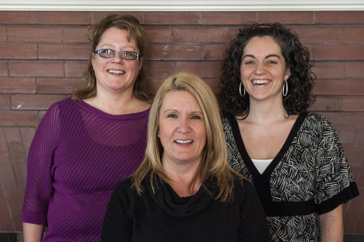 Photo of three personnel of the Small Business Development Center