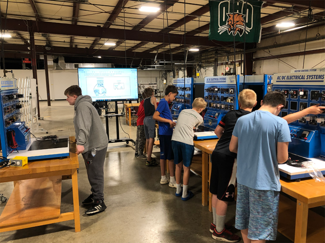 Middle school students at robotics camp