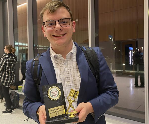 Casey Patterson, with mock trial award