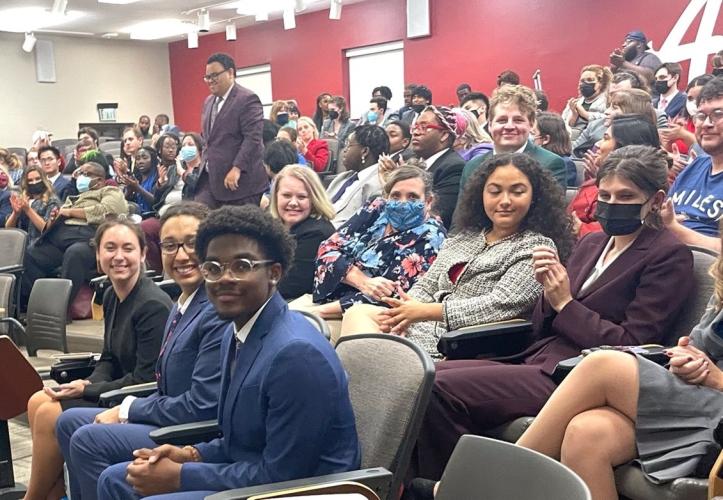 Members of Ohio University Speech and Debate team are shown at a tournament