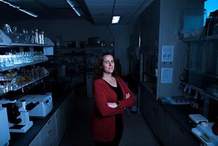 Erin Murphy standing in a research lab