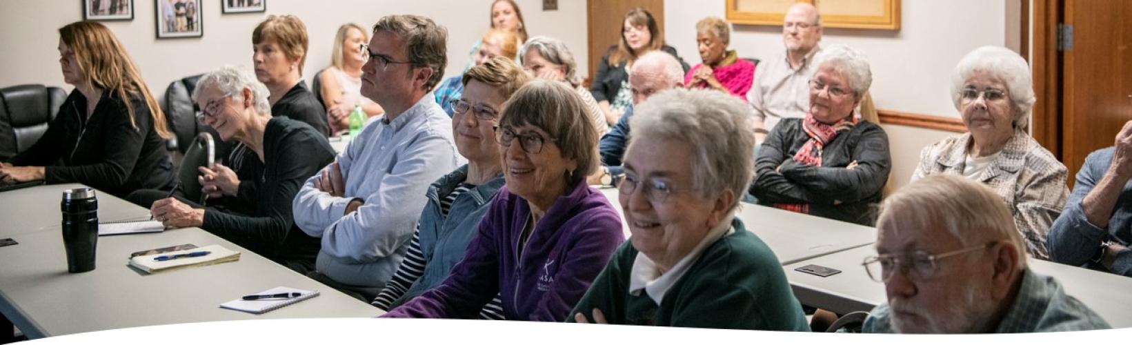 A photo of people at an Age-Friendly Athens County community meeting