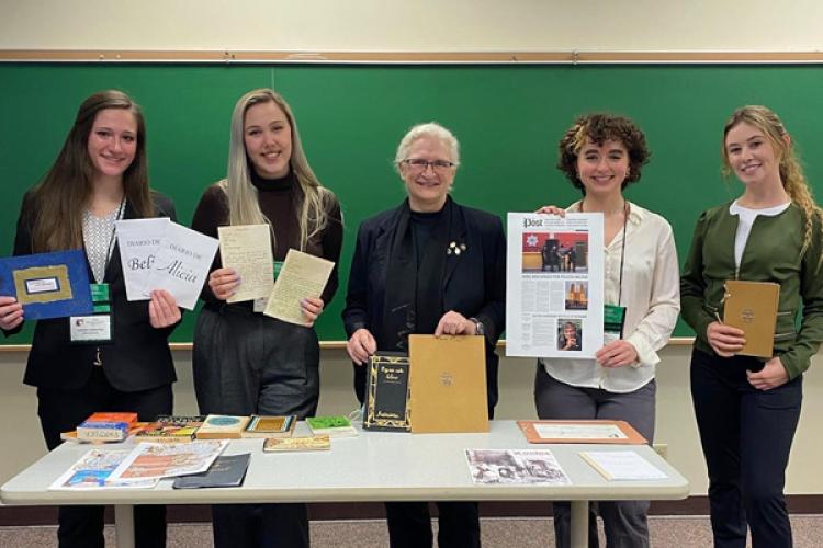 A student panel on Fictocrítica at the 2022 Ohio Latin Americanist Conference. From left, Isabelle Leimkuhler, Jordan Horstman, Dr. Betsy Partyka, Abby Neff, and Kylie King.