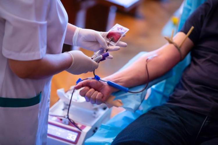 Nurse drawing blood from a blood drive donor