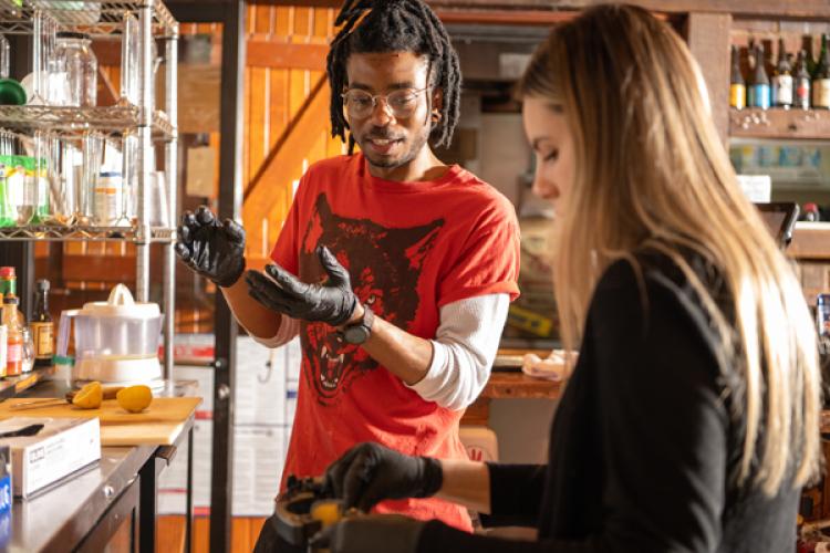 Jackie O's Brewer Deshawn Brunner and Francesca Carney get ready to brew “Sun Tea.” a recipe she developed in CHEM4501 in 2022.