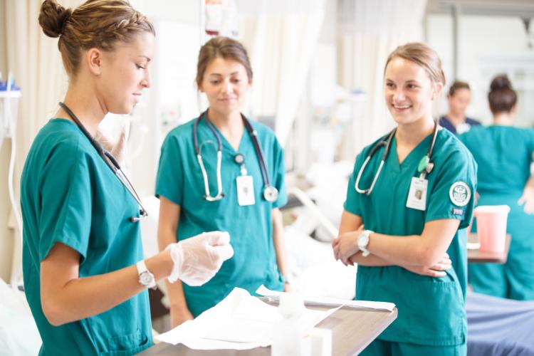 School of Nursing students are shown in a clinical lab