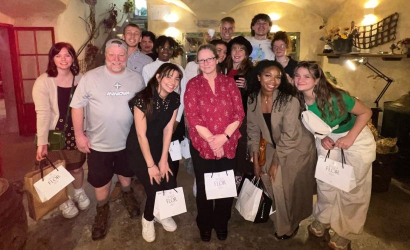 OHIO students involved in the Florence Retail Tour pose for a photo inside of a business