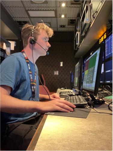 An OHIO alumnus sits at a computer