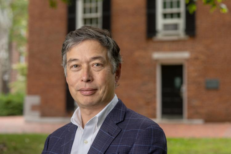 Dean Matthew Ando. outside his 186-year-old office in Wilson Hall.