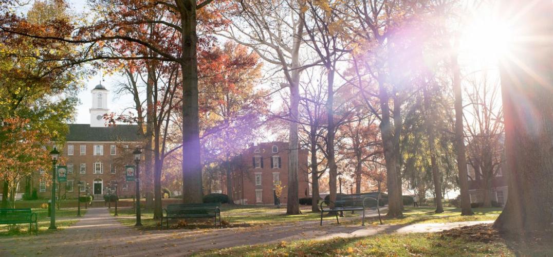 The sun shines on Cutler Hall on College Green in Athens, Ohio