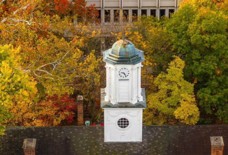 Cutler Hall is shown surrounded by colorful leaves during fall in Athens, Ohio