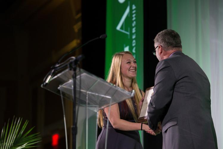 A student is honored at the Student Leadership Awards