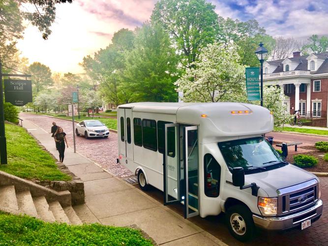 An OHIO shuttle picks up passengers near Scripps Hall