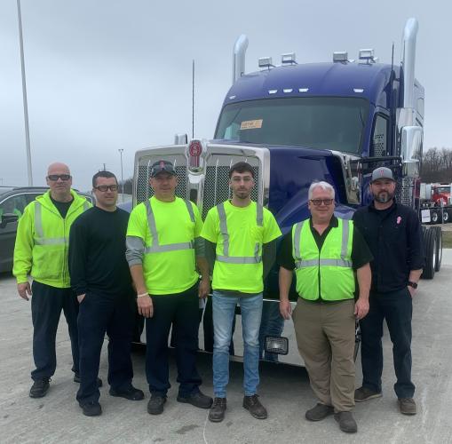 Blake McCathren and Kenworth employees