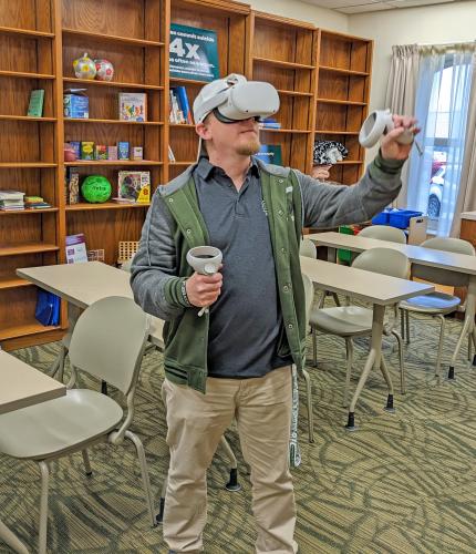 Student uses VR headset