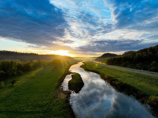 The Hocking River and the hills of southeastern Ohio are shown at sunrise