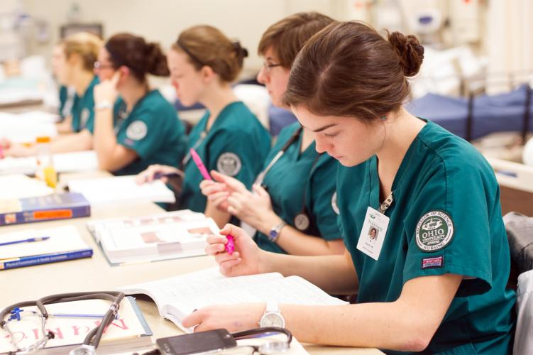 A row of OHIO nursing students engaged in classroom instruction