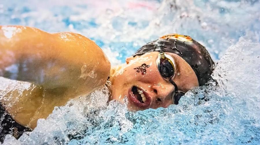 OHIO alum Ryan Grzybowski's photo of Olena Sadovska swimming in a 2021 swim meet.