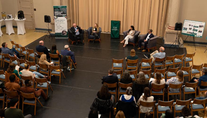 Audience members listen to the panel discussion at the Environmental Studies 50th Anniversary event.