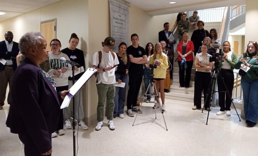 OHIO students, faculty and staff listen to a speaker in the Schoonover Center for the plaque dedication ceremony