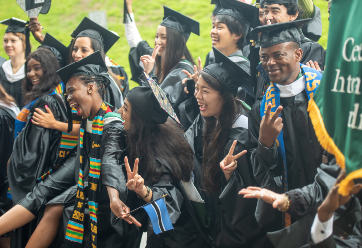 Graduates of the Center for International Studies gather together for a photo at Commencement