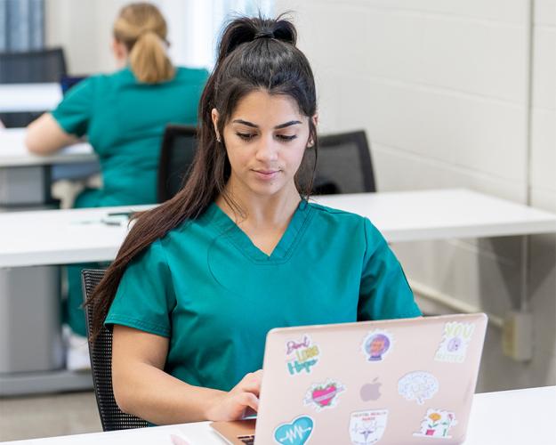 A nurse professional earning their MSN degree from OHIO Online.