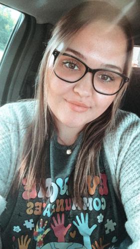 Photo of young woman with glasses