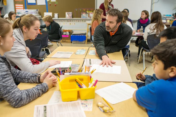 Community Engaged Scholars in a public school classroom