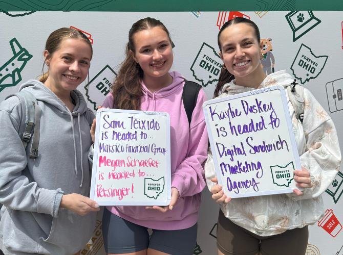 OHIO College of Business students displaying where they will be going for thier summer internships.