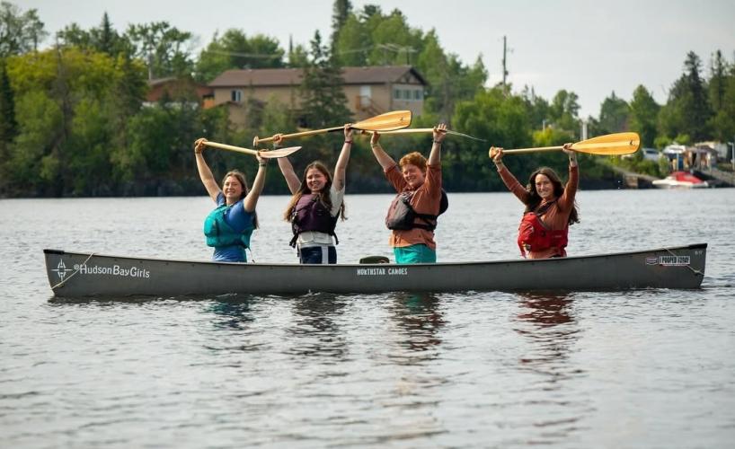 Helena Karlstrom and three other women are shown in a canoe out on the water